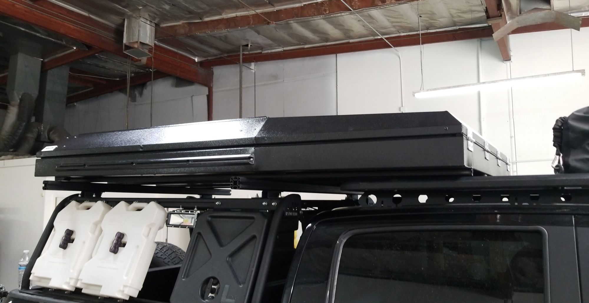 Alu-Cab tent mounted on rack